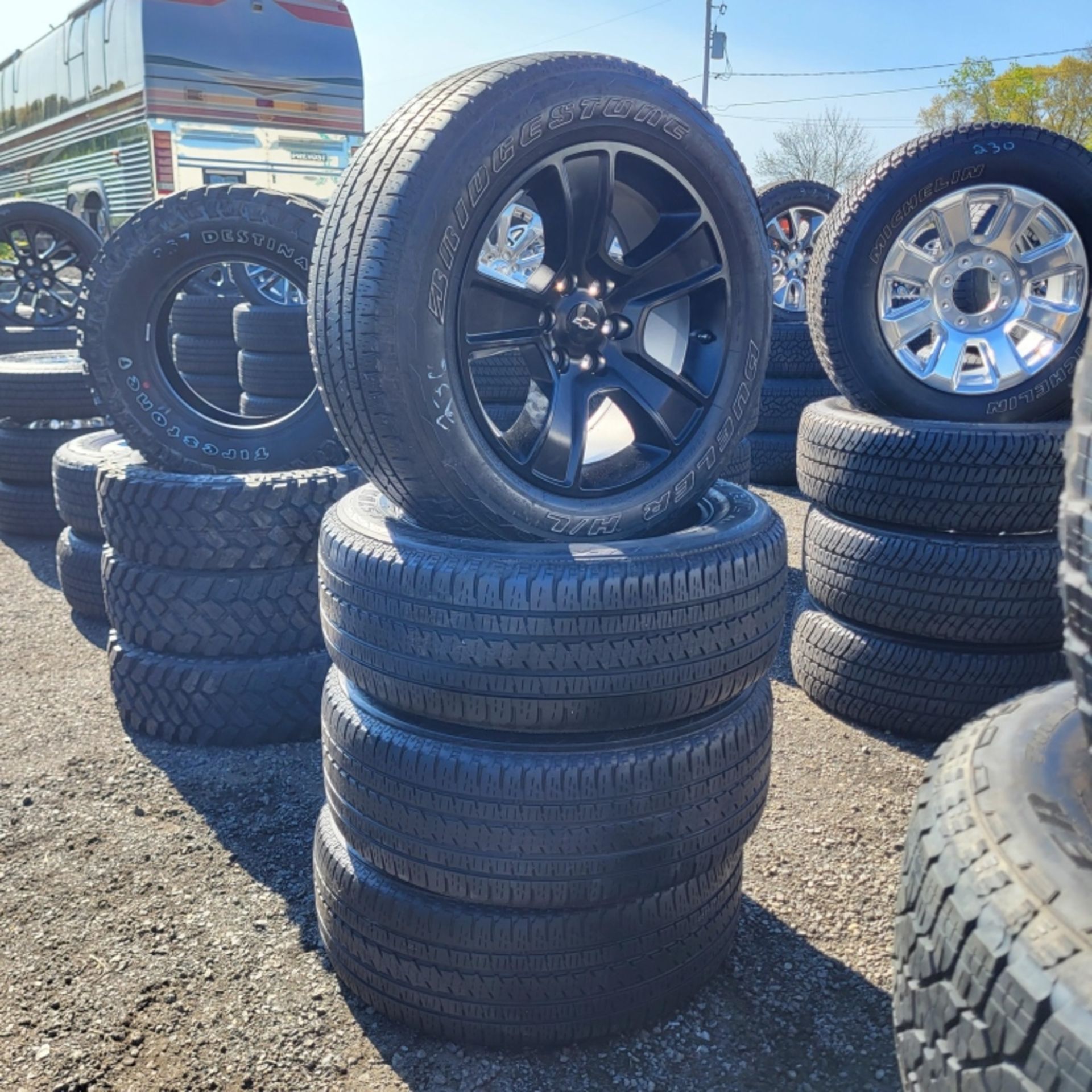 4 x Bridgestone 275 55 20 on chevy rims