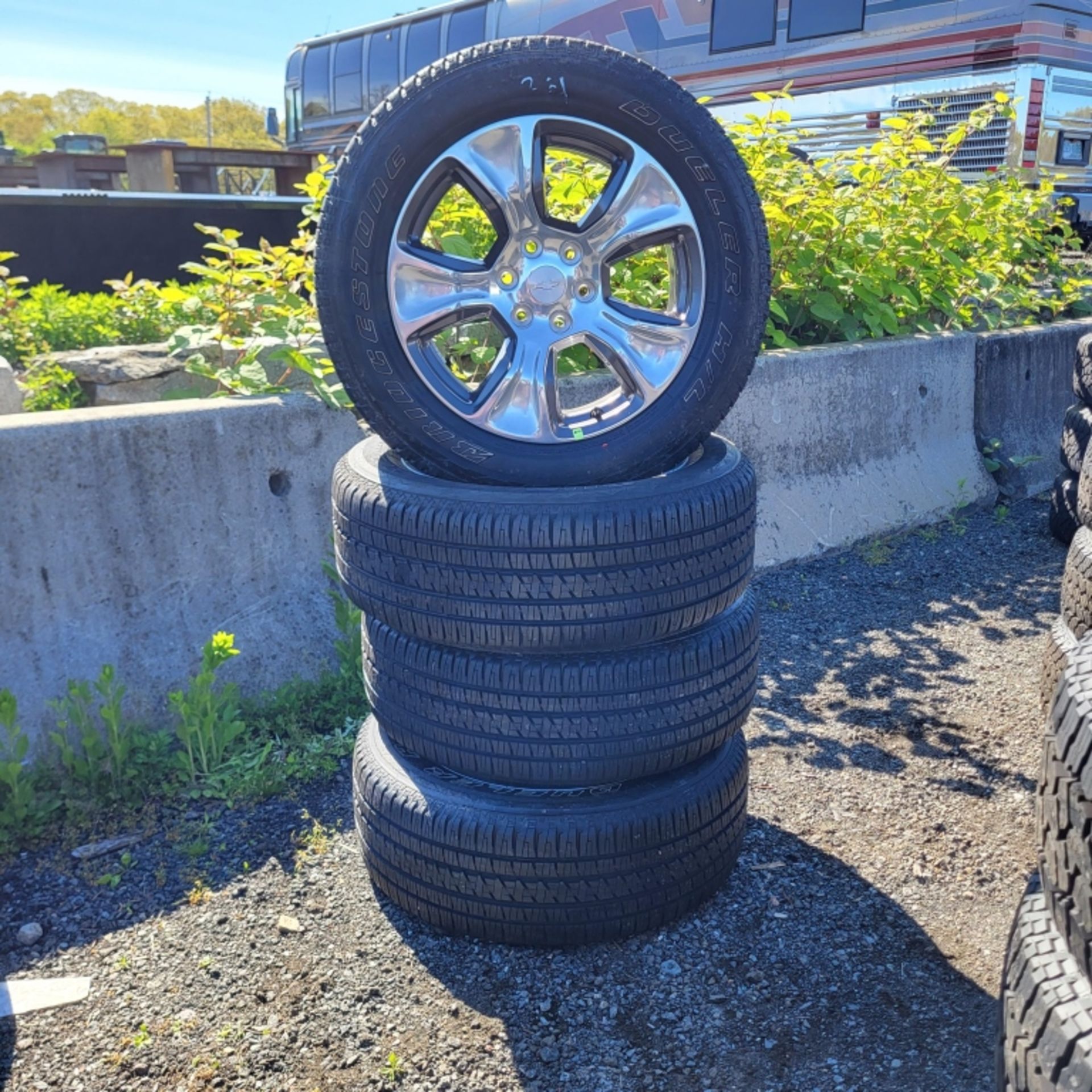 4 x Bridgestone 275 55 20 on chevy rims