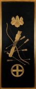 A FRAMED JAPANESE TEXTILE WITH DECORATION OF A BOW, QUIVER AND ARROWS AND TWO KAMON (FAMILY CRESTS)