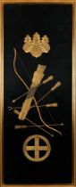 A FRAMED JAPANESE TEXTILE WITH DECORATION OF A BOW, QUIVER AND ARROWS AND TWO KAMON (FAMILY CRESTS)