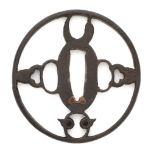 A JAPANESE IRON TSUBA (HAND GUARD) OF MARU GATA (ROUND FORM), CIRCA 1650-1750