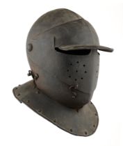 A CLOSE HELMET IN THE NORTH ITALIAN STYLE OF THE FIRST QUARTER OF THE 17TH CENTURY, 20TH CENTURY