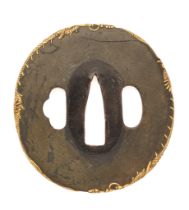 A JAPANESE TSUBA (HAND GUARD) OF MARU GATA (ROUND FORM), CIRCA 1700-1800