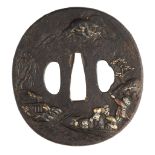 A JAPANESE IRON TSUBA (HAND GUARD) OF MARU GATA (ROUND FORM), CIRCA 1700-1800