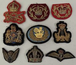 A QUANTITY OF MILITARY AND NAVAL EMBROIDERED AND CLOTH BADGES