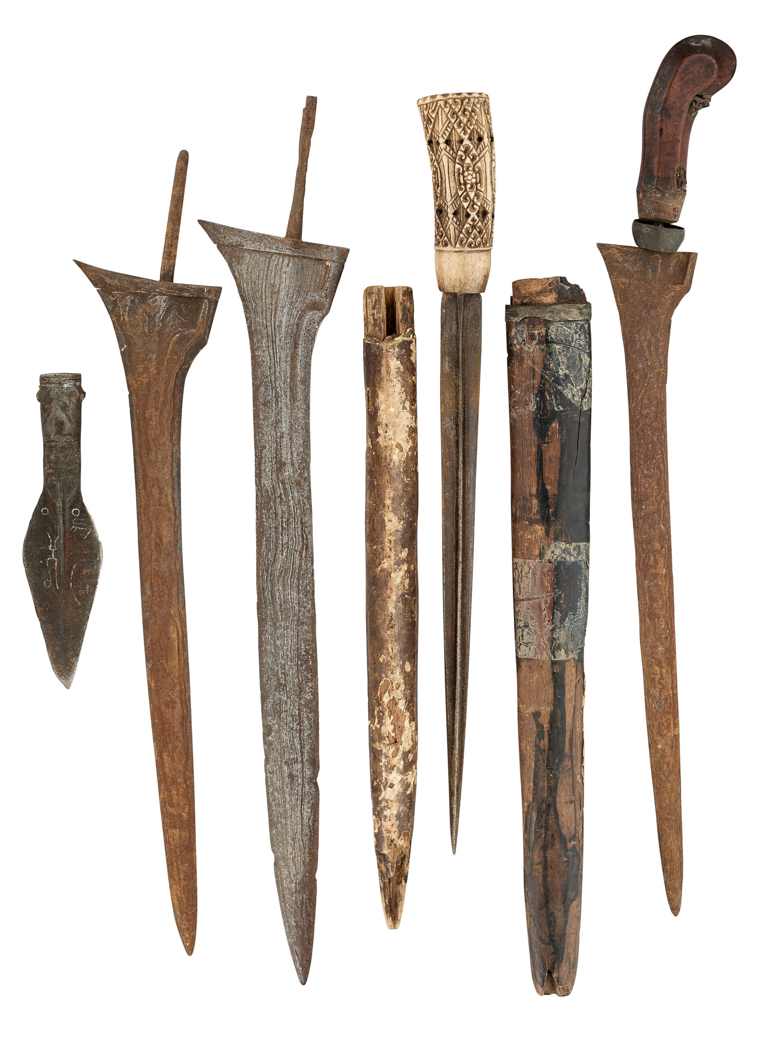 FIVE MALAYSIAN DAGGERS (KRIS), A DAGGER AND TWO SPEARHEADS, 19TH CENTURY