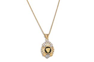 AN 18CT GOLD VERSACE STYLE PENDANT, on a chain