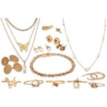 A MISCELLANEOUS COLLECTION OF GOLD ITEMS, comprising five dress rings, chains & bracelets, cuff
