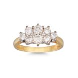 A DIAMOND CLUSTER RING, the brilliant cut diamonds mounted in 18ct yellow gold. Estimated: weight of