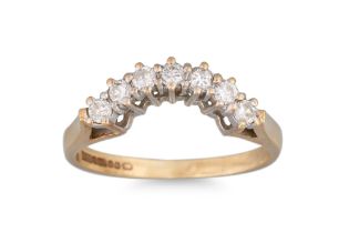 A DIAMOND SET SHAPED BAND, mounted in 9ct gold. Size: J - K