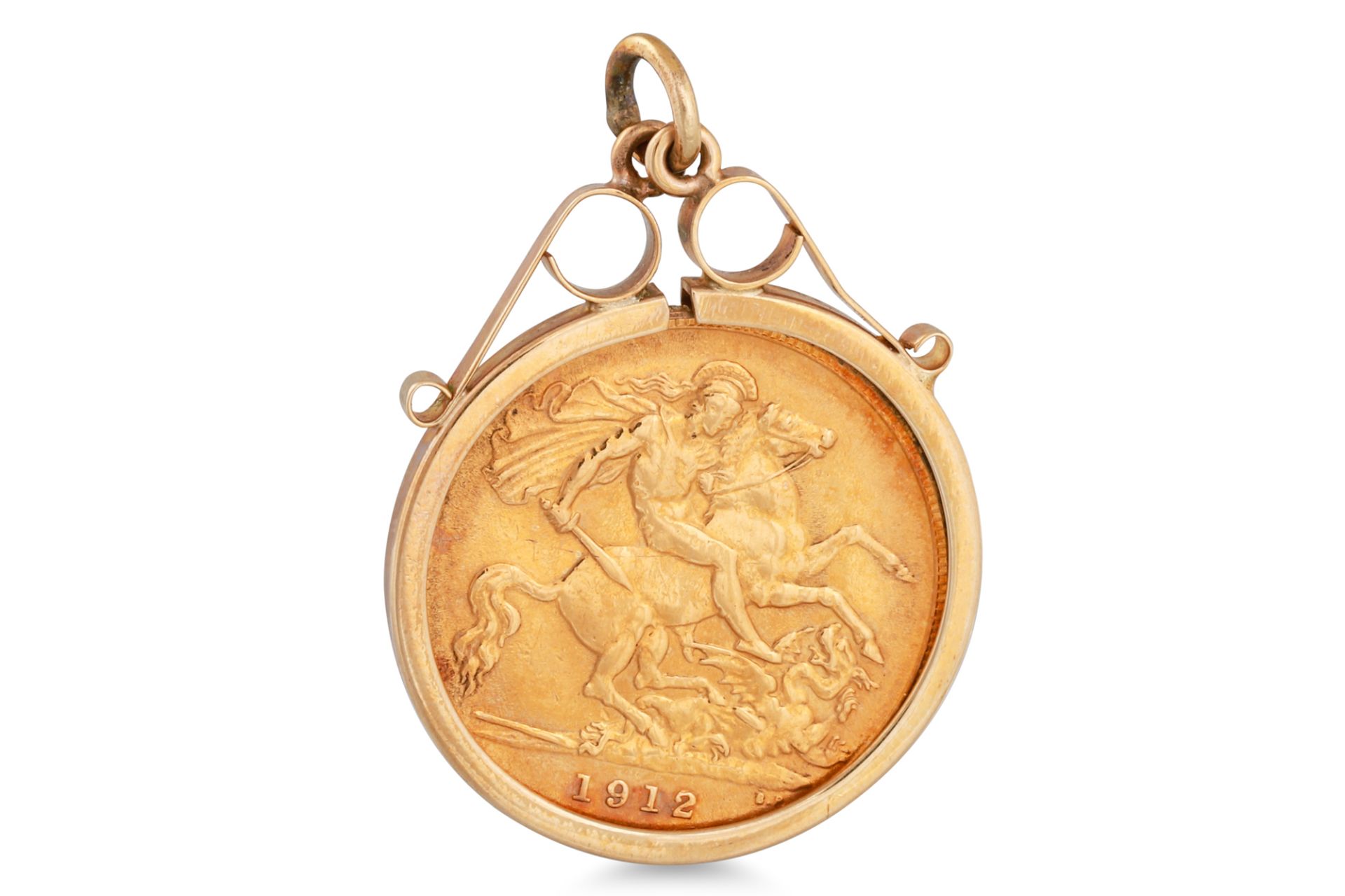 A GEORGE V GOLD HALF SOVEREIGN (ENGLISH), 1912 with a 9ct gold pendant frame, total weight 5.1 g.