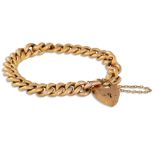 AN ANTIQUE GOLD CURB LINK BRACELET, with padlock