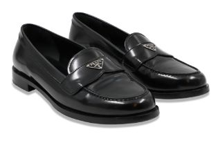 A PAIR OF PRADA LADY'S SLIP ON SHOES, size 37.5 eu Condition is very good