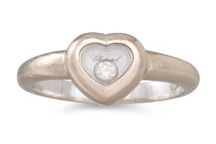 A CHOPARD HEART SHAPED HAPPY DIAMOND RING, mounted in 18ct white gold, signed Chopard, in Chopard