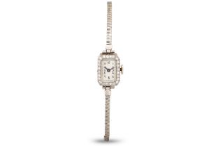 A VINTAGE PLATINUM AND DIAMOND LADY'S COCKTAIL WATCH, with 9ct white gold bracelet strap