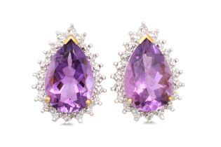 A PAIR OF DIAMOND AND AMETHYST CLUSTER EARRINGS, the pear shaped amethyst to diamond surround,