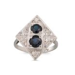 AN ANTIQUE DIAMOND AND SAPPHIRE PLAQUE RING, of lozenge form, mounted in platinum, size L