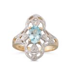 A TOPAZ RING, the oval topaz to an openwork diamond set surround, mounted in 9ct white gold, size K