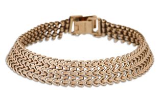 A 9CT GOLD FANCY LINK BRACELET, with safety chain