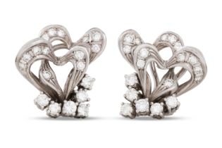 A PAIR OF VINTAGE DIAMOND SET EARRINGS, of scrolled form, set with brilliant cut diamonds, mounted