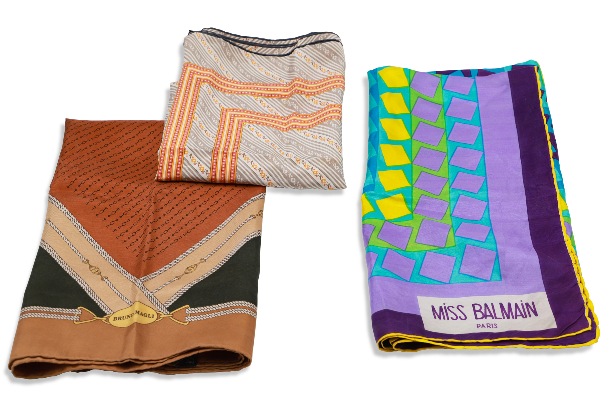 TWO BRUNO MAGLI SILK SCARVES, together with a Miss Balmain scarf