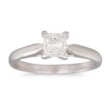 A DIAMOND SOLITAIRE RING, by Michael Hill, the princess cut diamond mounted in 14ct white gold.