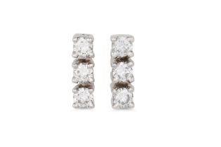 A PAIR OF DIAMOND EARRINGS, each set with brilliant cut diamonds, mounted in 18ct yellow gold.