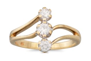 A DIAMOND THREE STONE RING, of twist design, mounted in 9ct gold, size K - L