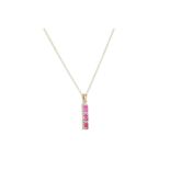 A THREE STONE RUBY DROP PENDANT, mounted in 9ct gold, on a chain