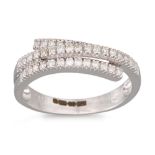A DIAMOND RING, the triple row diamonds mounted in 9ct white gold, size L