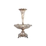 A VICTORIAN SHEFFIELD PLATED TIERED EPERGNE, the trumpet flute above a tiered dish over a stepped