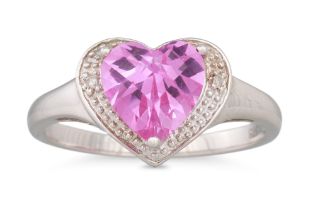 A HEART SHAPED CLUSTER RING, the heart shaped pink stone to diamond accents, mounted in white