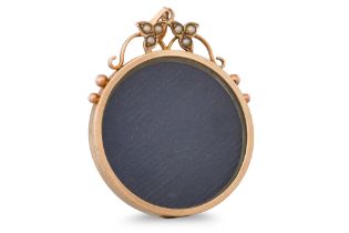 AN ANTIQUE GOLD DOUBLE SIDED LOCKET, seed pearl set