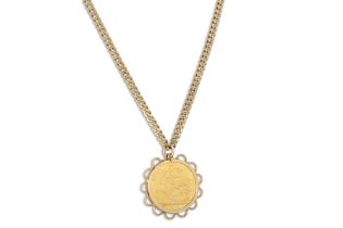 A GEORGE V GOLD SOVEREIGN, 1910, together with a 9ct gold flat curb link neck chain, total weight 16