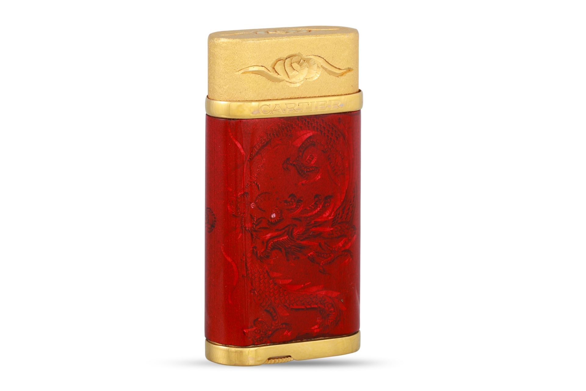 A CARTIER LIGHTER, gold-plated Ltd. edition, dragon decoration, purchased 1/8/2003, boxed, spare