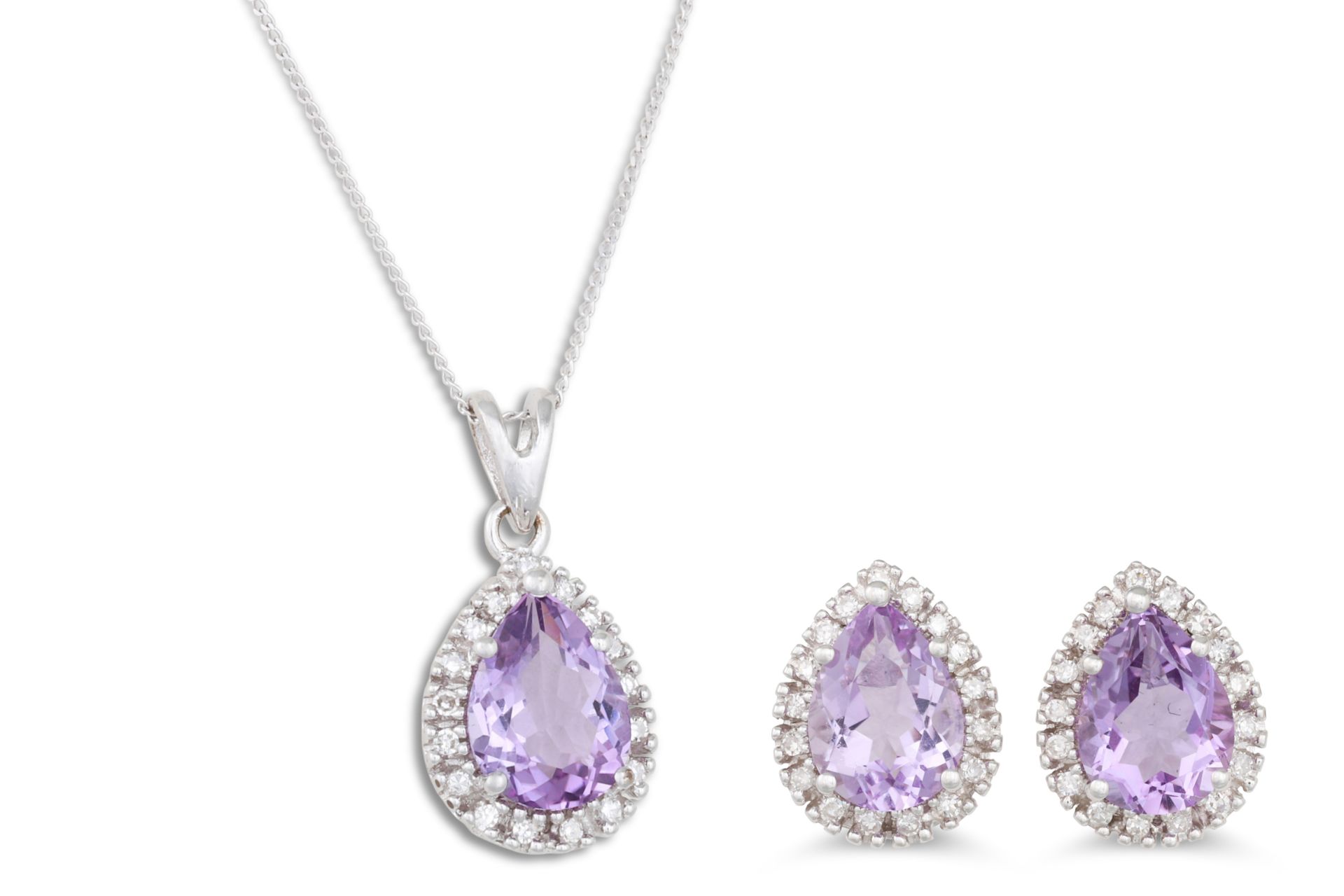 A DIAMOND AND AMETHYST PENDANT, the pear shaped amethyst to diamond surround, mounted in white gold,