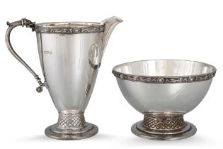 A FINE QUALITY MODERN IRISH SILVER MATCHING SUGAR BOWL & MILK JUG, gilded interior, applied Celtic