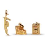 TWO 18CT GOLD CHARMS, together with a 14ct gold charm