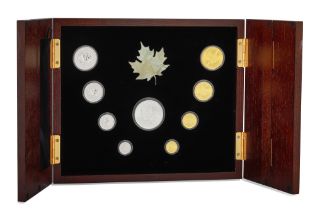 A CANADA 1988 PROOF 3 METAL CASED COIN SET, 4 gold 1.85 Troy Oz/57.5g .9999, 4 platinum 1.85 Troy