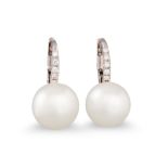 A PAIR OF SOUTH SEA PEARL AND DIAMOND EARRINGS, the white pearls to diamond hoops, mounted in 18ct