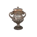 AN IMPORTANT GEORGE IV SILVER TWIN HANDLED TROPHY CUP AND LID, gilded interior, applied grape & vine