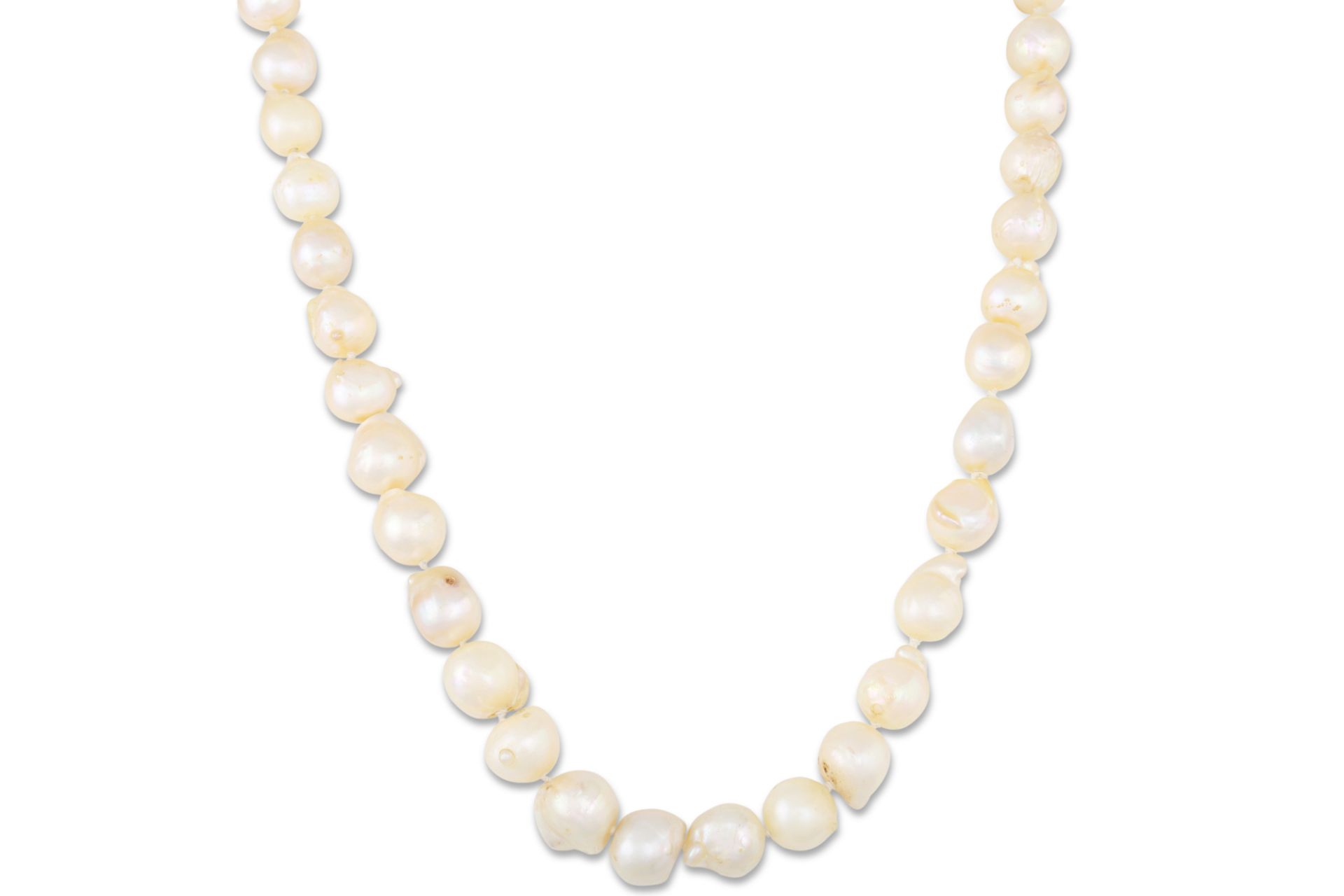 A BAROQUE PEARL NECKLACE, cream tones with a 9ct gold clasp