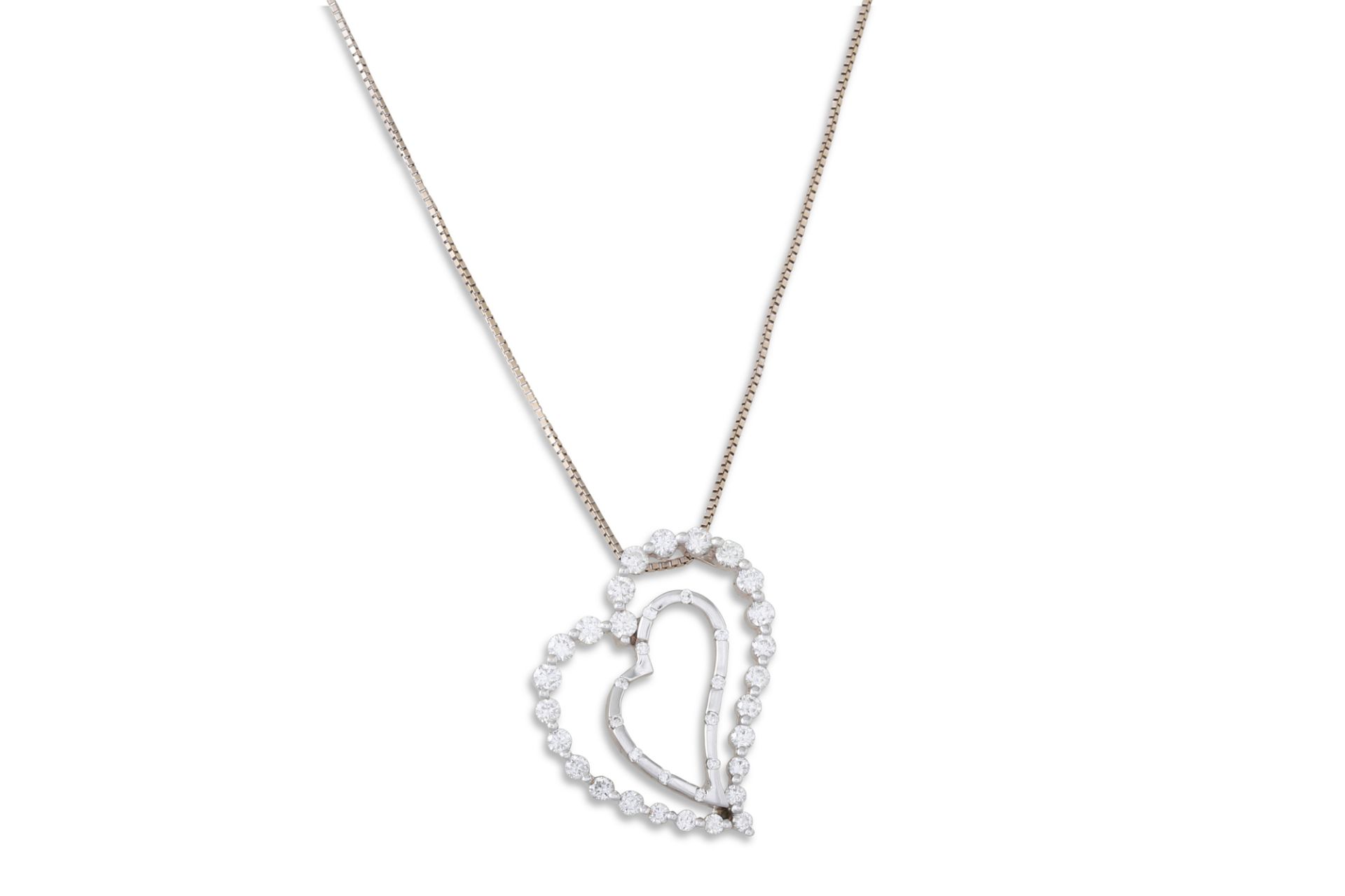 A DIAMOND PENDANT, the heart shaped pendant mounted in 18ct white gold, on a white gold chain.