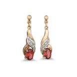 A PAIR OF DIAMOND AND GARNET DROP EARRINGS, mounted in yellow gold