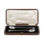 A CASED PAIR OF ART DECO SILVER PRESERVE SPOONS, Sheffield 1923, ca 6" long, 37 g. engraved with the