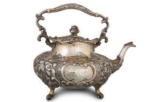 A MOST IMPRESSIVE WILLIAM IV SILVER TEA POT, of large proportions, decorated with floral repossi,