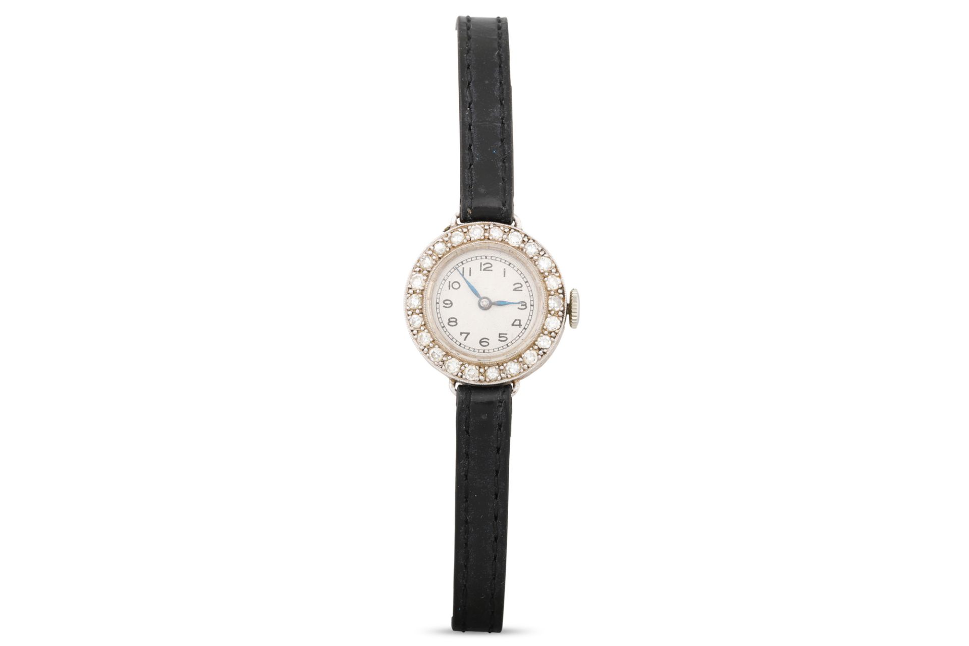 A VINTAGE PLATINUM LADY'S COCKTAIL WATCH, diamond set bezel, silvered face with Arabic markers,