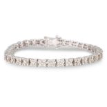 A DIAMOND BRACELET, comprising clusters of four brilliant cut diamonds, mounted in 18ct gold.