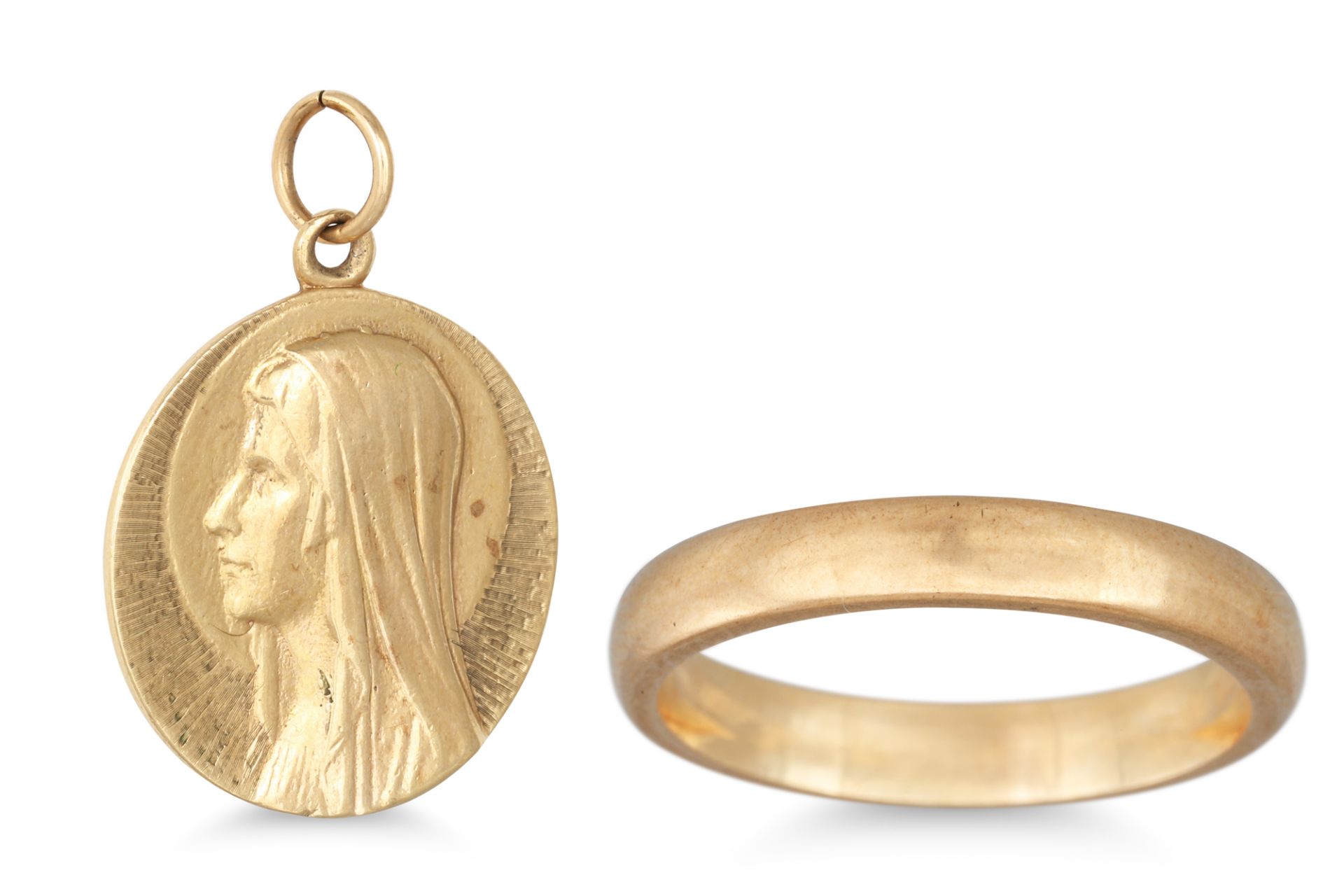 A 9CT GOLD “LOURDES” MEDALLION, together with a 9ct gold band ring, 12.3 g.