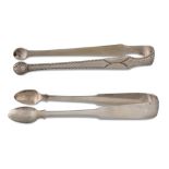 TWO PAIRS OF GEORGE III IRISH SILVER TONGS, one fiddle pattern, by James Scott, Dublin 1818 with the